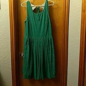Green open back dress